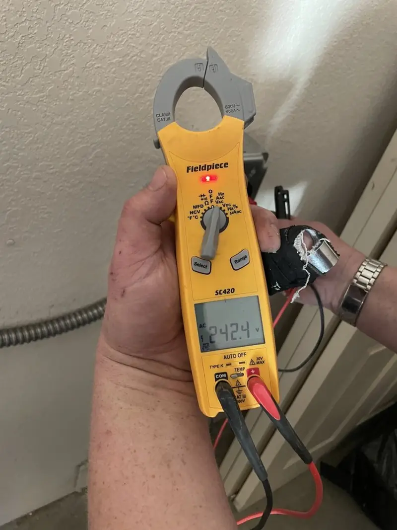 Voltage testing with clamp meter during Circuit Breaker Repair in South Middleton